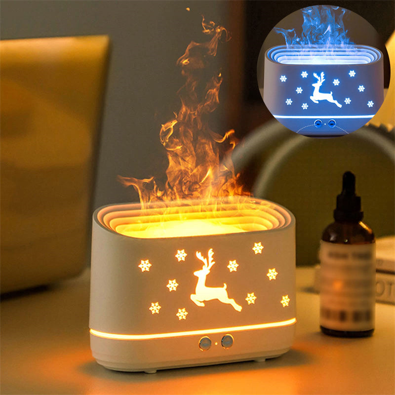 Vit doftspridare med ren och flamljus