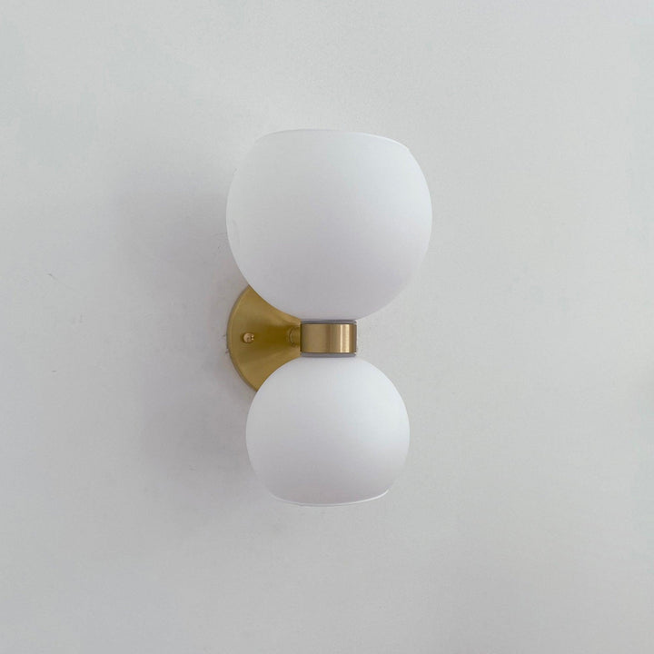 Rund pärlvägglampa