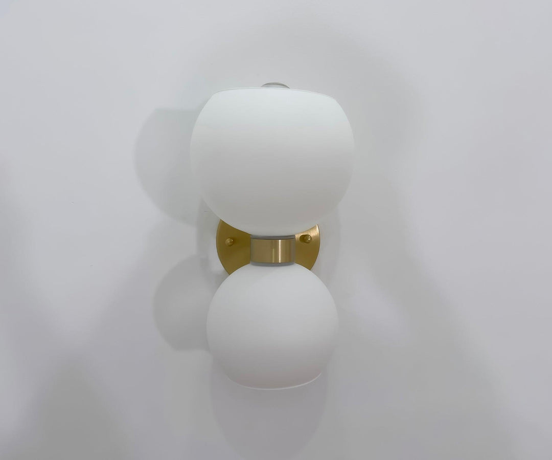 Rund pärlvägglampa
