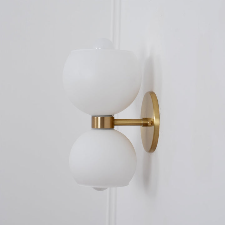 Rund pärlvägglampa