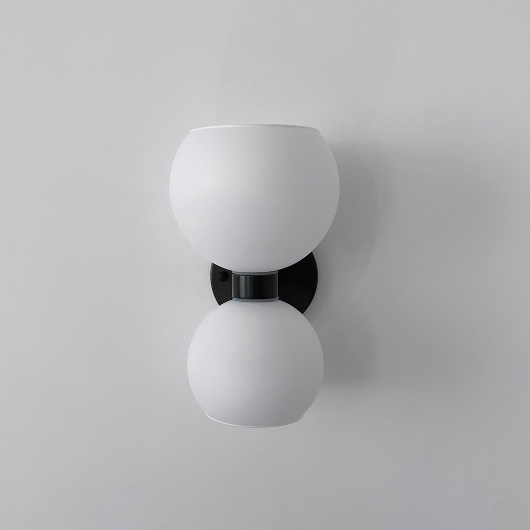 Rund pärlvägglampa
