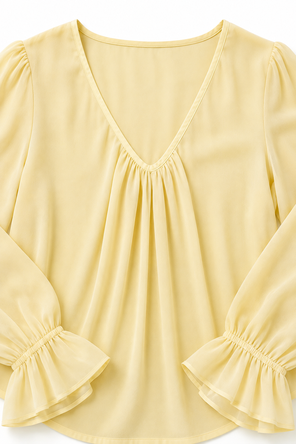 Pleatrelle – Blus z plisami i urringning w v-ringning z falbanami