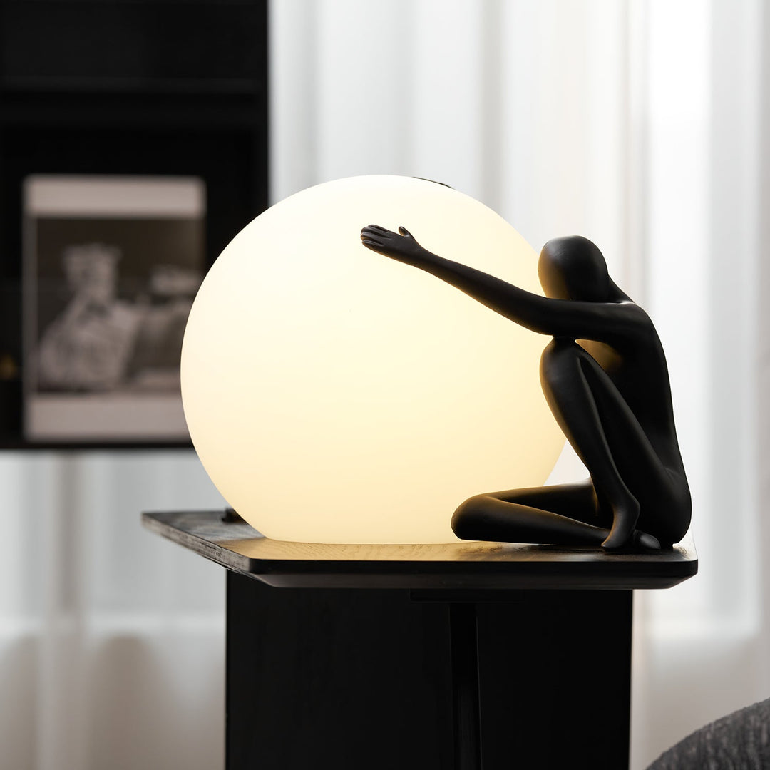 Humanoid Ball Holding Table Lamp