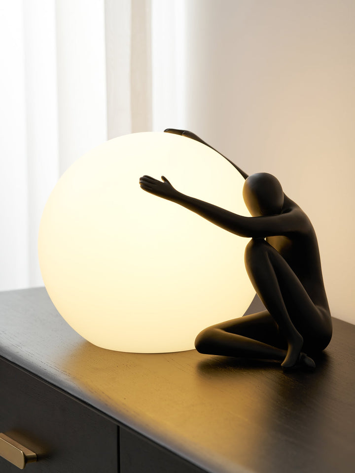 Humanoid Ball Holding Table Lamp