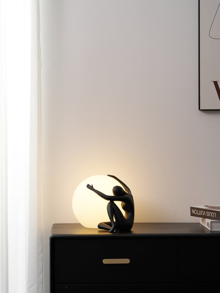 Humanoid Ball Holding Table Lamp