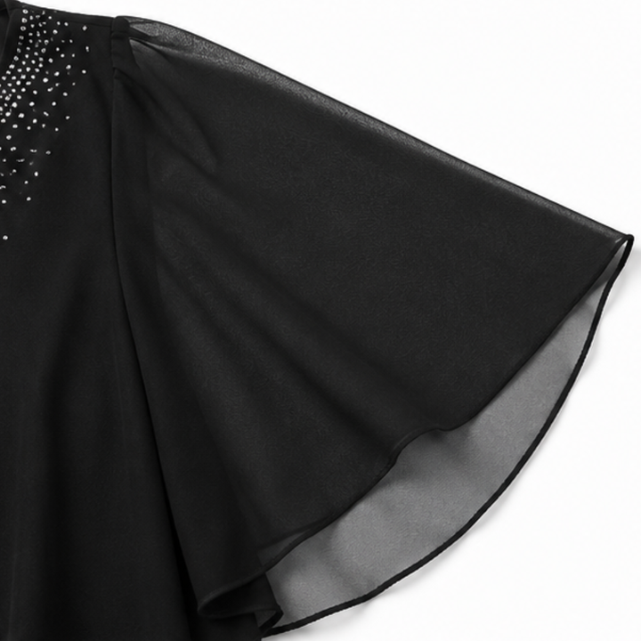 Wearbella – Klänning z peleryną, som omija kłopoty z szalem