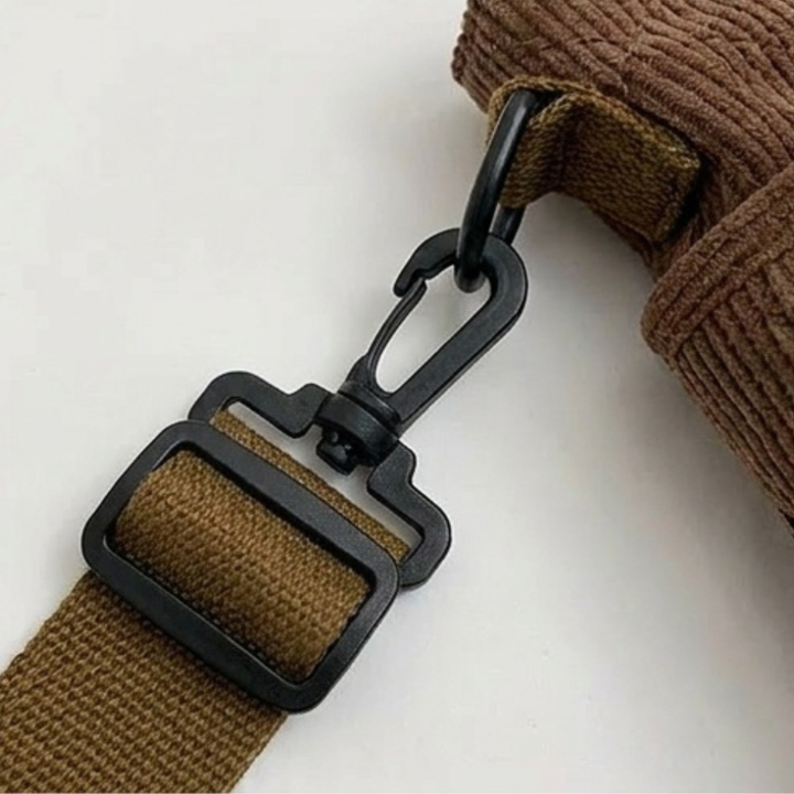 Bowette – Handväska z korduroyu z nadrukiem kokardek med ficka på laptopa