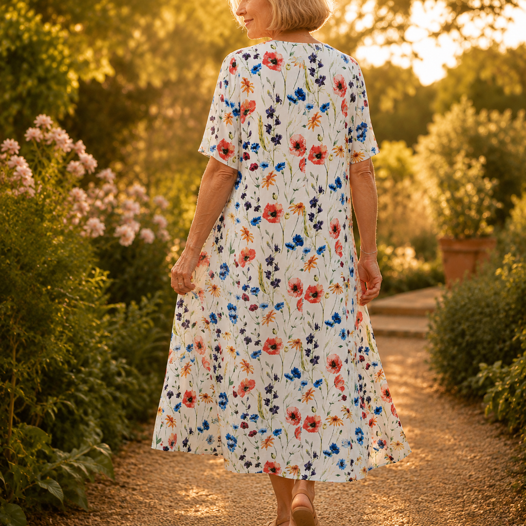 Fiorella – Midi klänning w blommig mönster z kieszeniami, przypominająca bawełnę