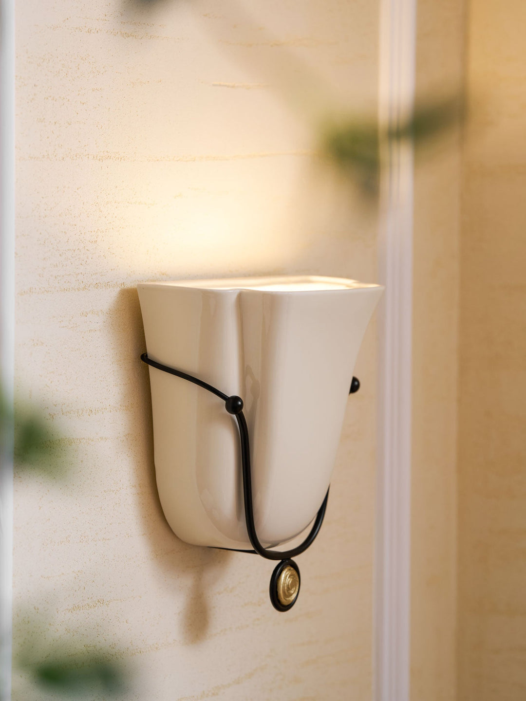 Solenne Snäcks vägglampa