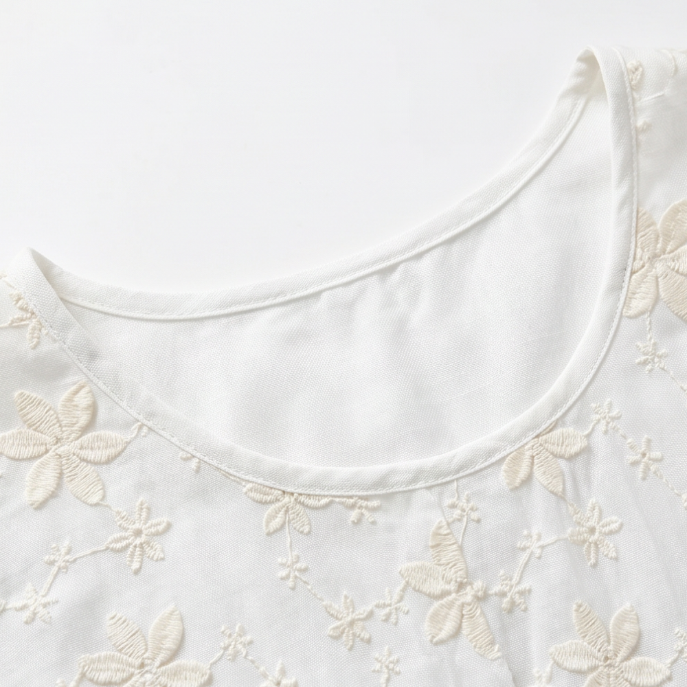 Floralé – Kobieca Blus z Haftowanymi Kwiatami w Stilu Peplum