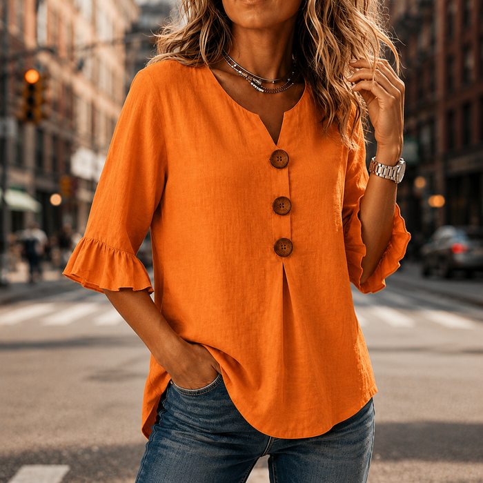 Laurelle – Blus z urringning w v-ringning i falbanami z knappar