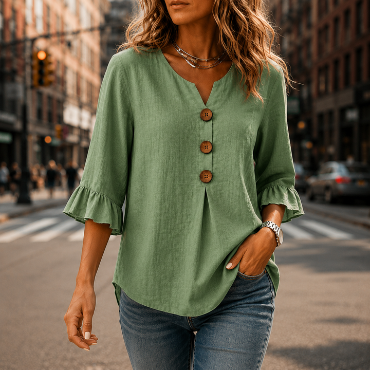 Laurelle – Blus z urringning w v-ringning i falbanami z knappar