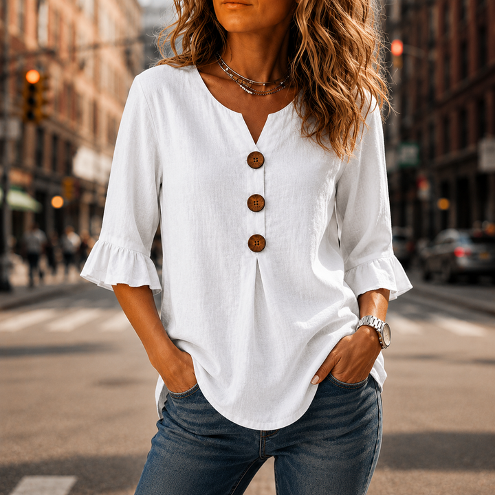 Laurelle – Blus z urringning w v-ringning i falbanami z knappar