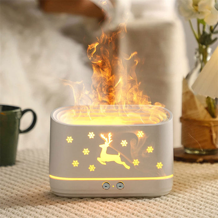 Vackerljus Doftspridare med ren, snöflingor och flamljus