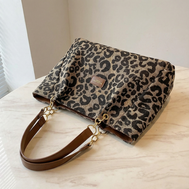 Lynxe - Väska w leopardmönster z detaljer kedja