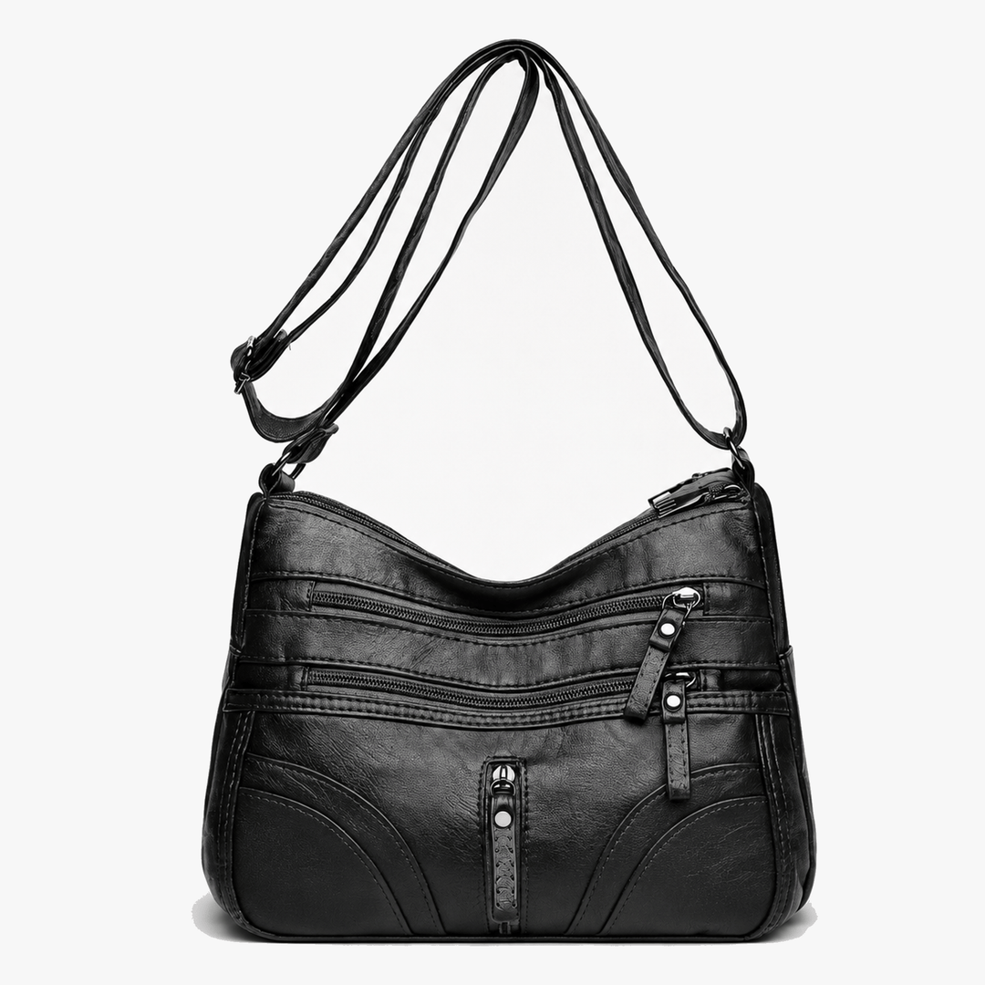 Caressa – Mjuk läder handväska crossbody med flera fickor