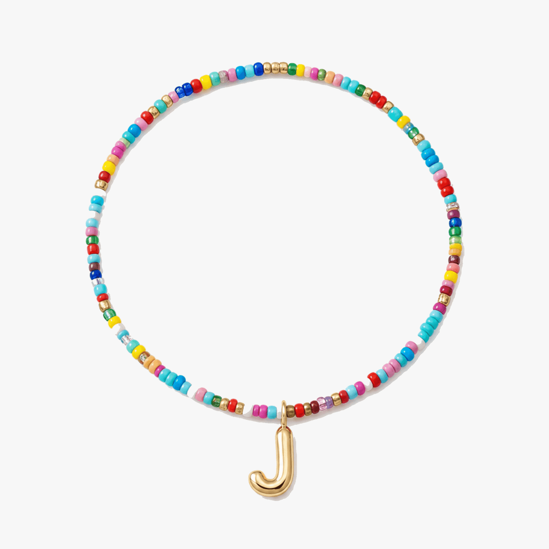Liora – Färgowy Halsband z Beadami z Inicjałem