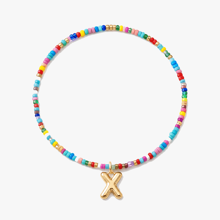 Liora – Färgowy Halsband z Beadami z Inicjałem