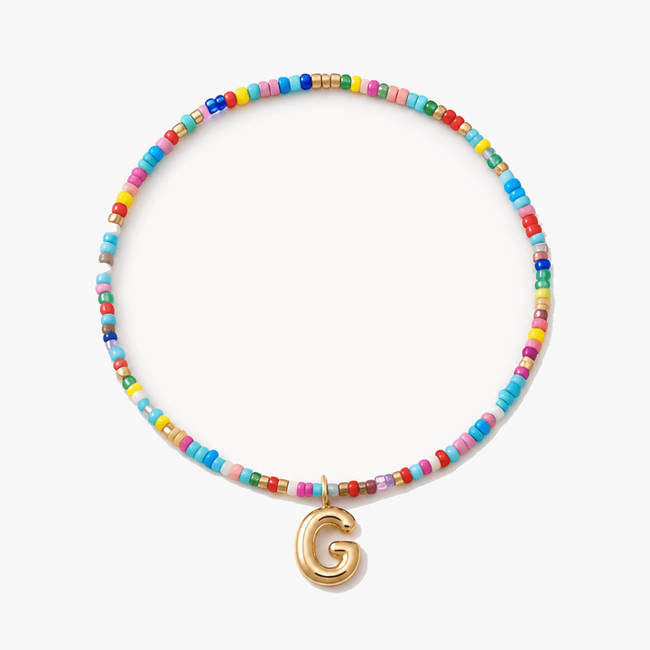Liora – Färgowy Halsband z Beadami z Inicjałem