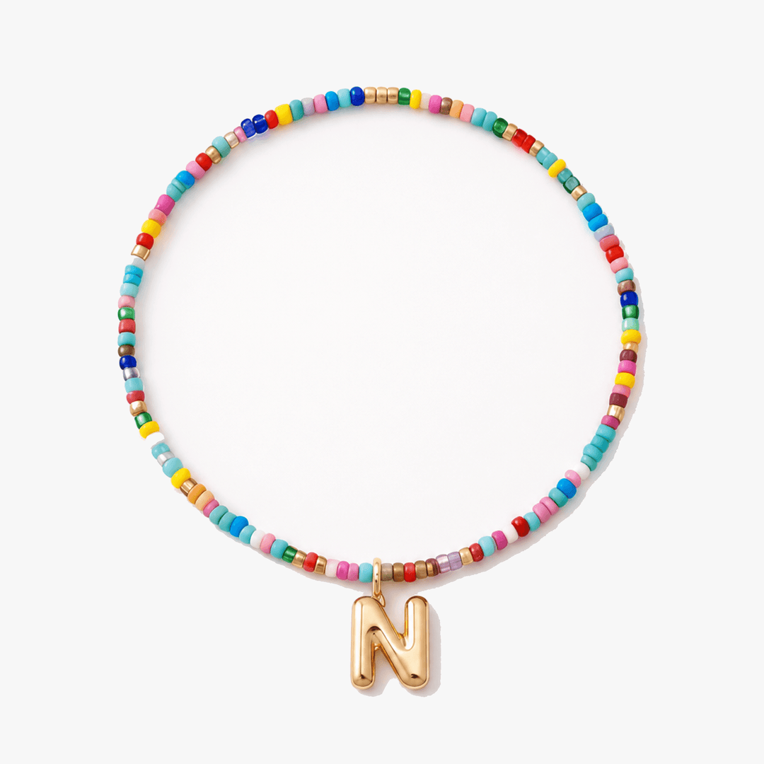 Liora – Färgowy Halsband z Beadami z Inicjałem