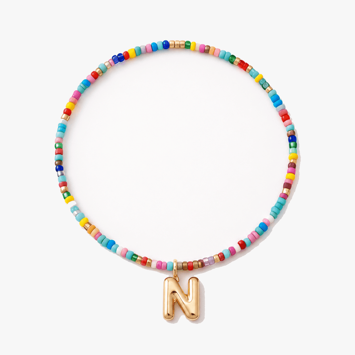 Liora – Färgowy Halsband z Beadami z Inicjałem