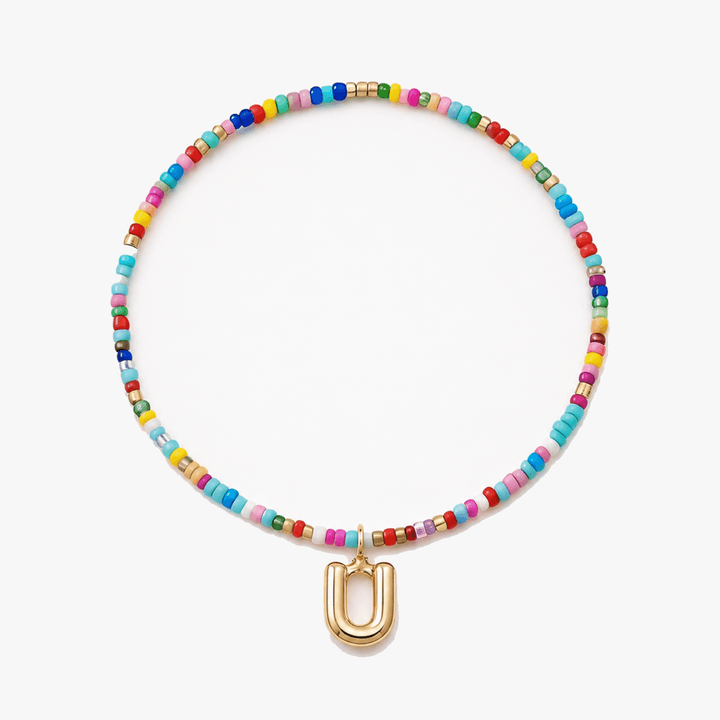 Liora – Färgowy Halsband z Beadami z Inicjałem