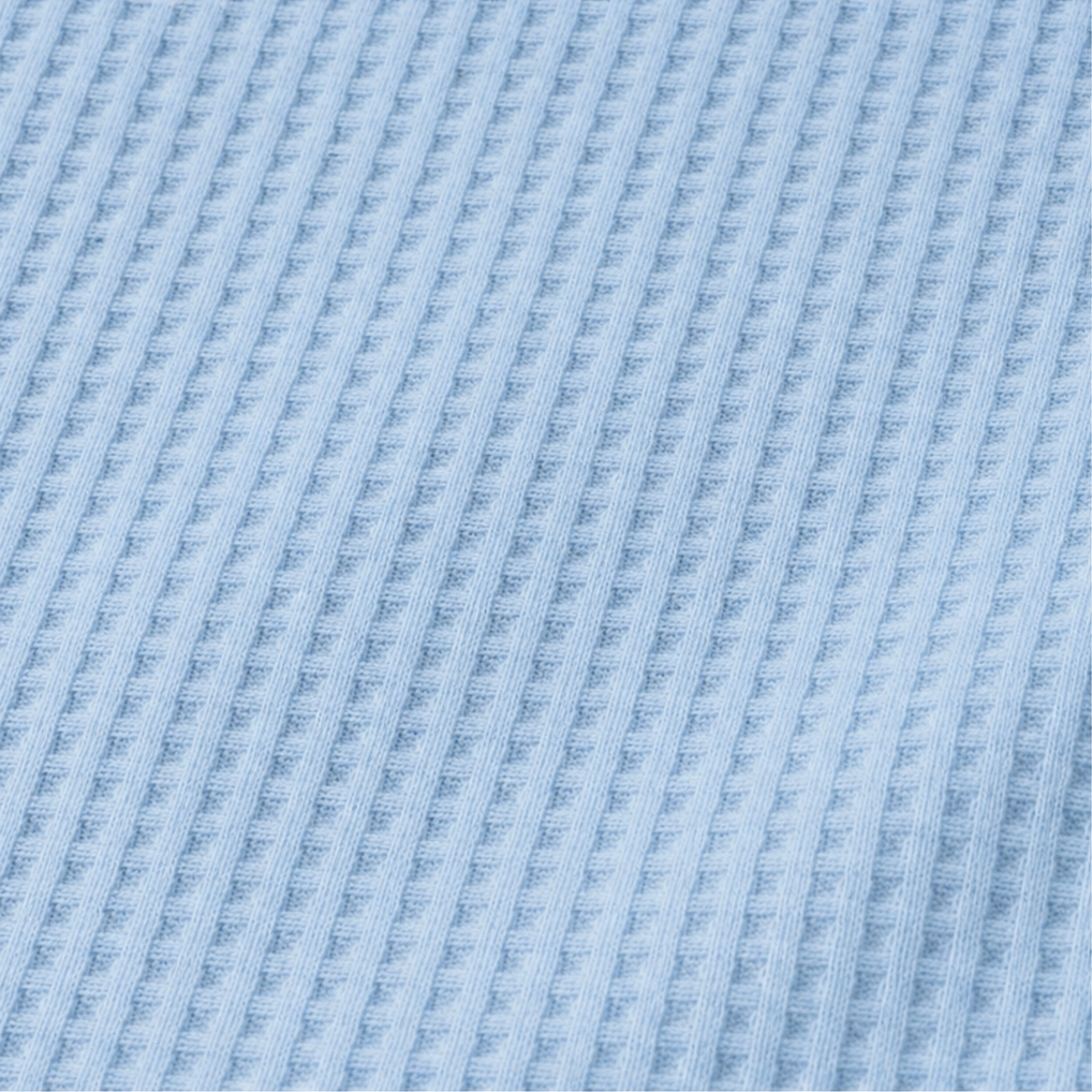 Draperly – Blus z asymetrycznym dołem w utseende dzianiny waflowej