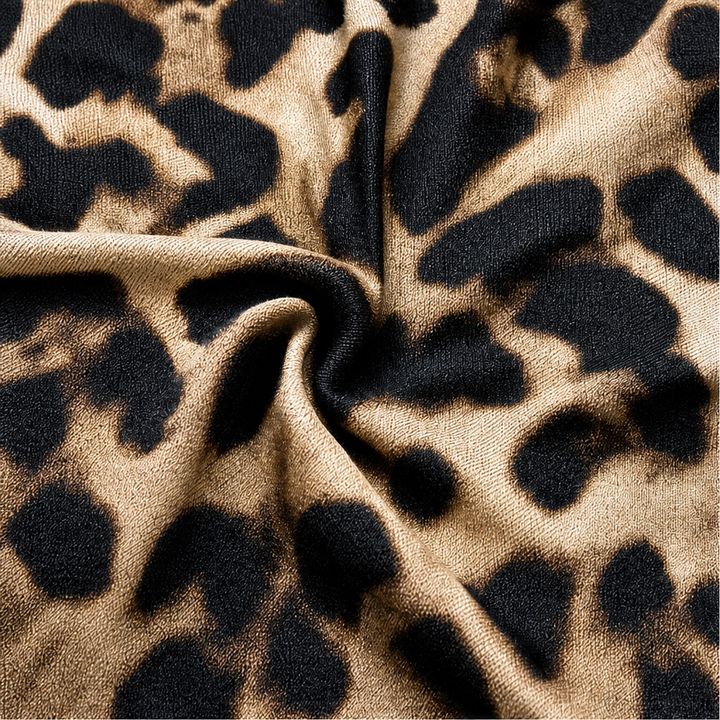 Veloura – Klänning midi w leopardmönster z koronkowym urringning w v-ringning