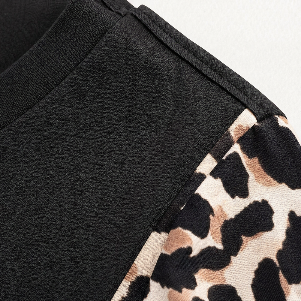 Wearleta – Blus z falbanami w stilu peplum z kontrastowymi ręKaffemi w leopardzie