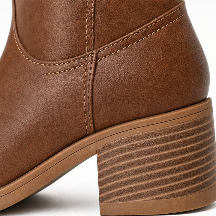 Tumvera – Boots med klack med bred öppning, sięgające över knät