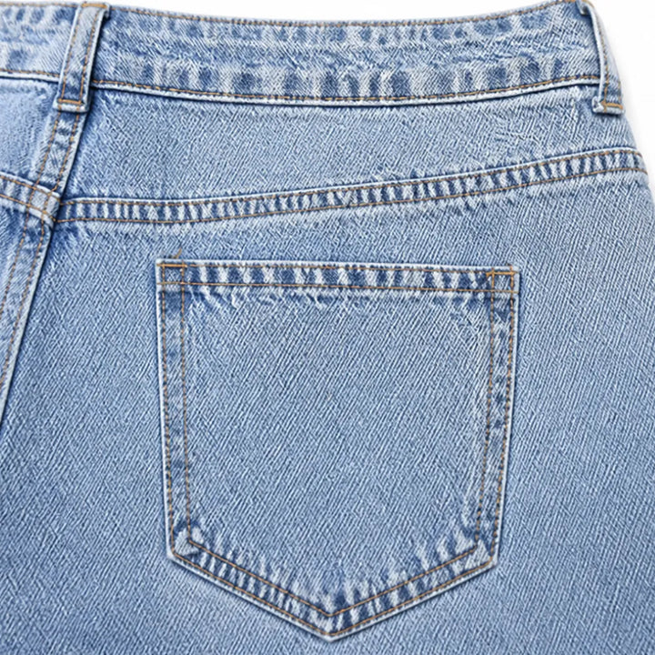 Vellara – Asymetryczne jeans z vida ben i wiązaniem w midja