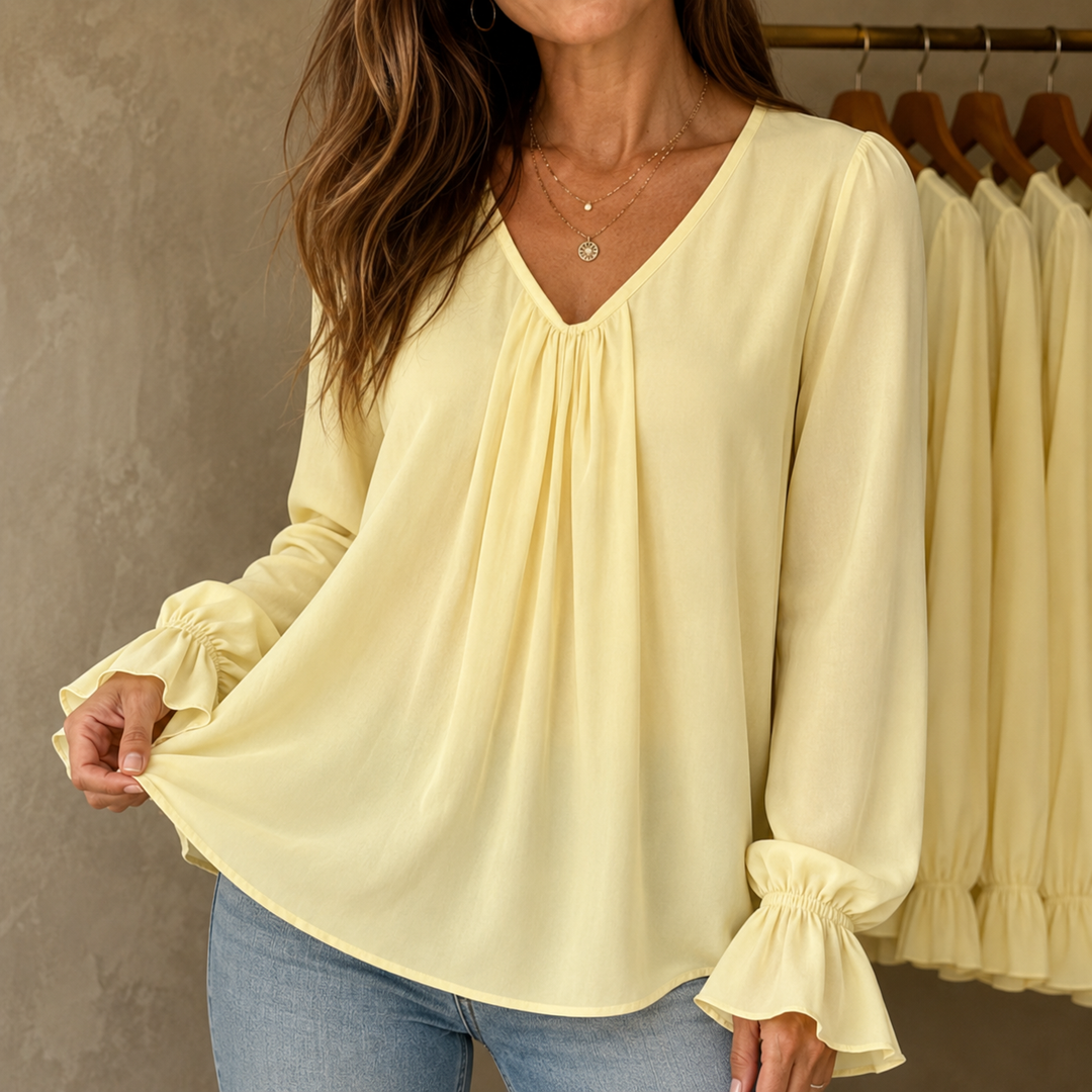 Pleatrelle – Blus z plisami i urringning w v-ringning z falbanami
