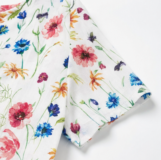 Fiorella – Midi klänning w blommig mönster z kieszeniami, przypominająca bawełnę