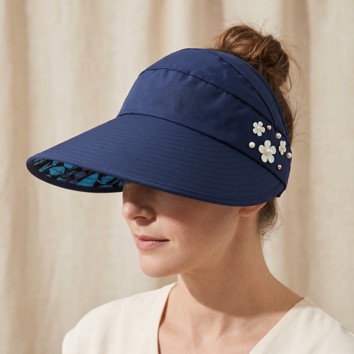 Solwen – Kapelusz przeciwsłoneczny z szerokim rondem i otworem på kucyk