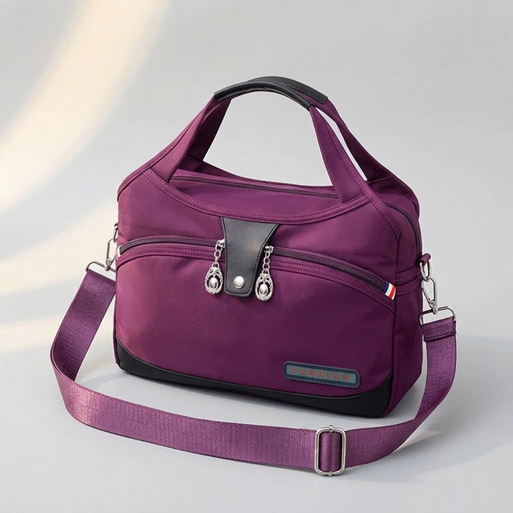 Vossa – Vattentät väska crossbody z 10 kieszeniami