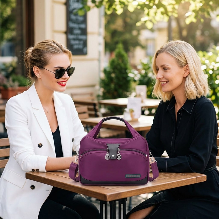 Vossa – Vattentät väska crossbody z 10 kieszeniami