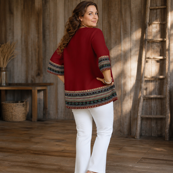 Vivelyn – Blus z kontrastowym finish i guzikiem framtill i form av litery V