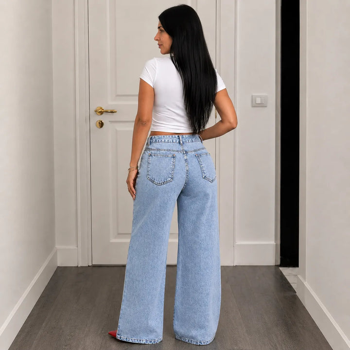 Vellara – Asymetryczne jeans z vida ben i wiązaniem w midja