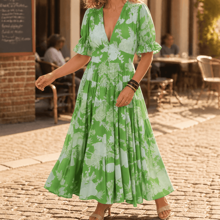 Minelda – Dam Blommig Klänning Maxi