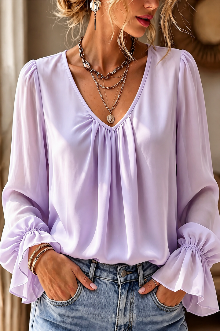 Pleatrelle – Blus z plisami i urringning w v-ringning z falbanami