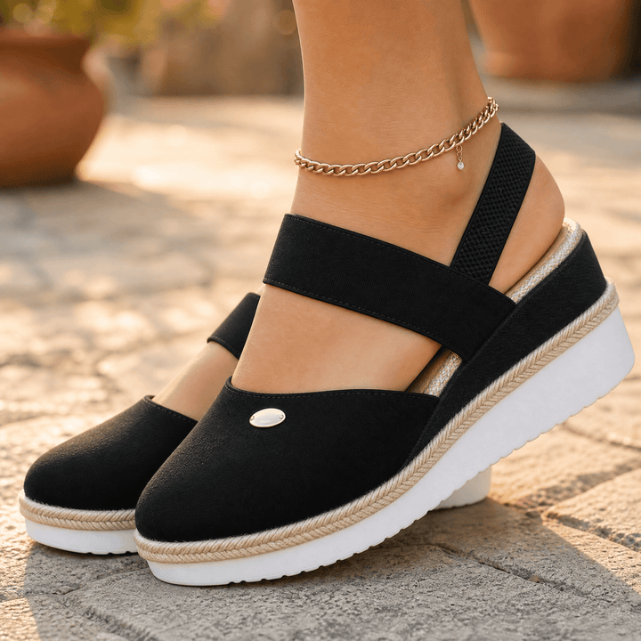 Stepwell – Bekväma sandaler på koturnie